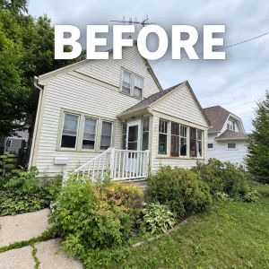 Before front exterior view of home prior to siding, window, and trim updates by Elite Home Renovations.   